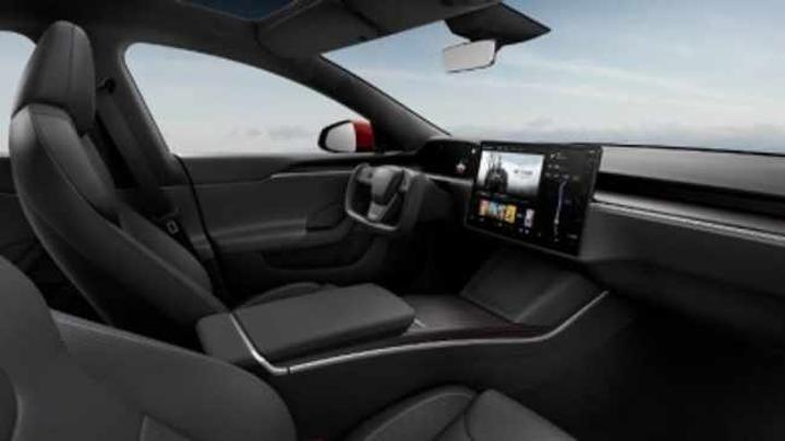 Tesla halts use of video games in moving cars amid safety probe Tesla halts use of video games in moving cars amid safety probe