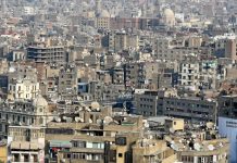 الحكومة توجه بطلاء واجهات المباني بلون واحد وتحدد المهلة