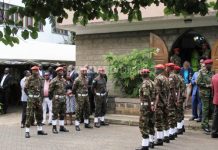 Sombre mood at funeral home as leaders stream in