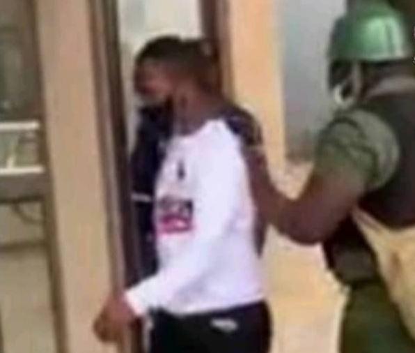 Times Umbutfo journalist with a camera watch helplessly as armed warder assaults citizen at the High Court. Times Umbutfo journalist with a camera watch helplessly as armed warder assaults citizen at the High Court.