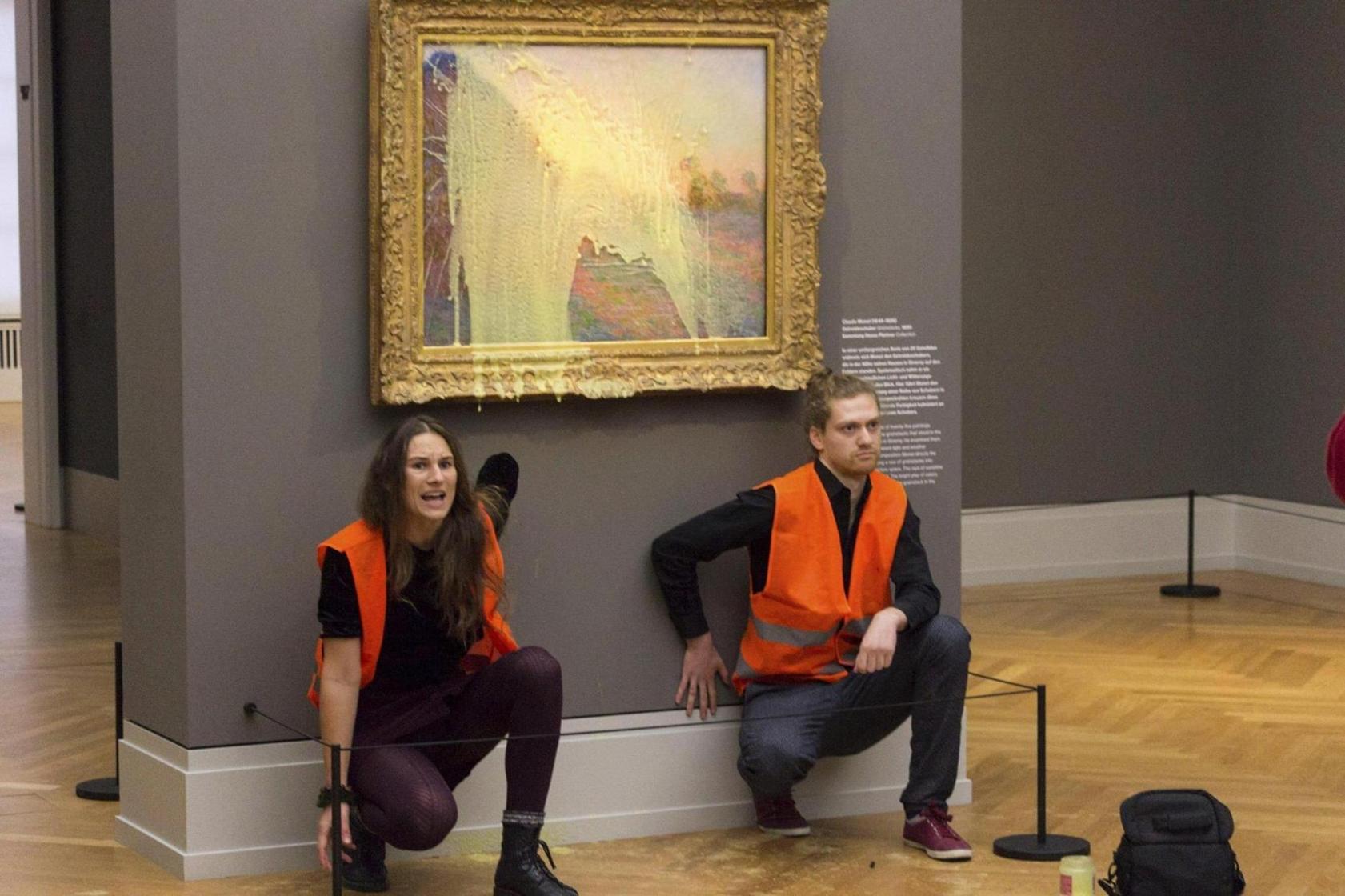 Activists hit Monet's painting to demand climate change measures Activists hit Monet's painting to demand climate change measures