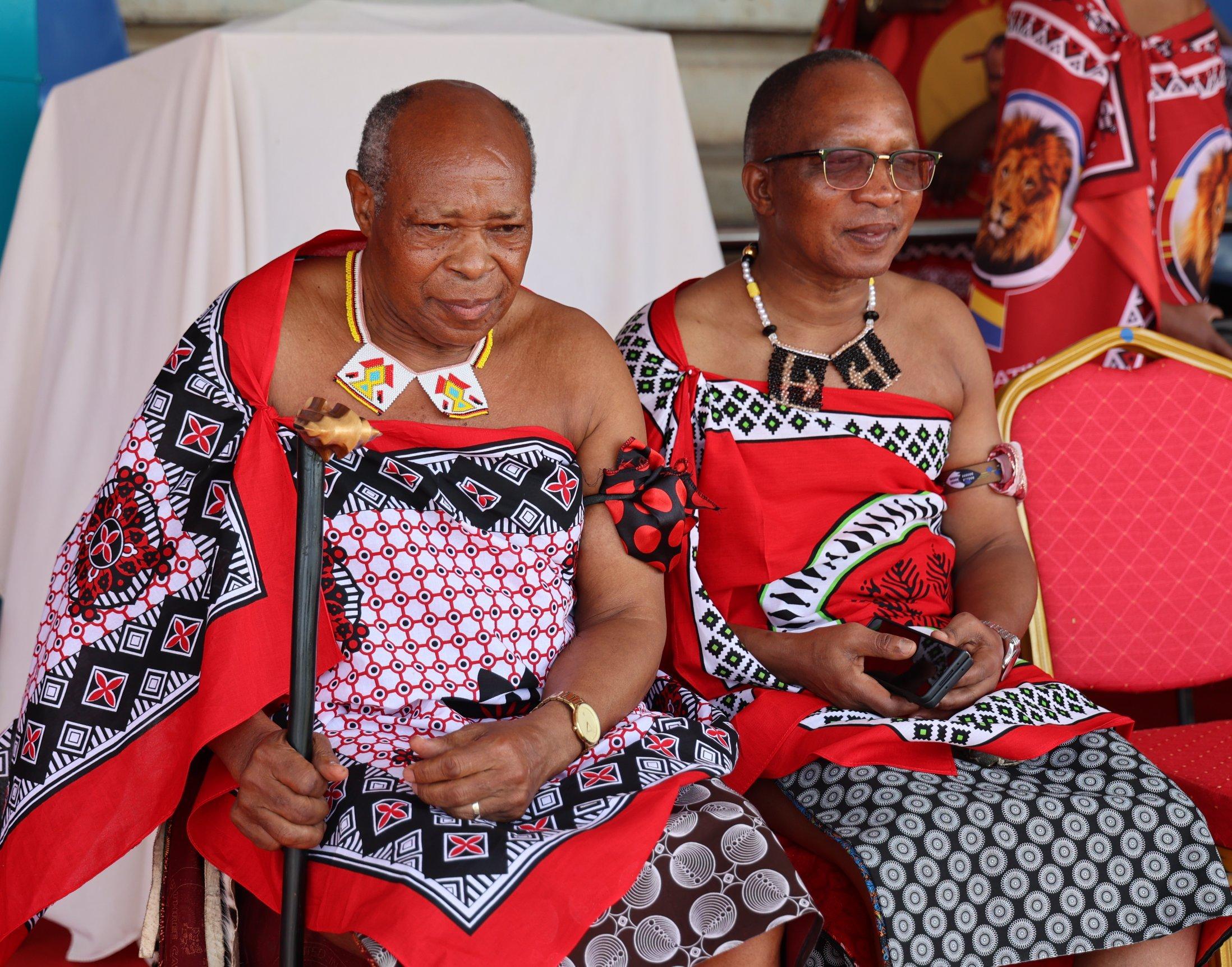 His Majesty King Mswati III engages with exhibitors as he tours the ...