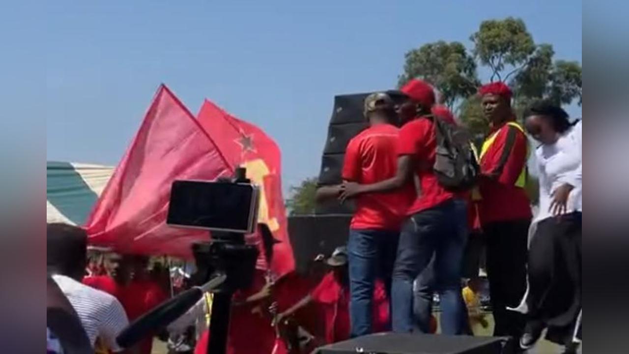 Communist Party of Swaziland(Cps) Members Stopped from Taking over Stage while Gospel Artist Phathwakahle Mabuza Performs during the TUCOSWA may Day Celebration. Communist Party of Swaziland(Cps) Members Stopped from Taking over Stage while Gospel Artist Phathwakahle Mabuza Performs during the TUCOSWA may Day Celebration.