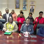 Minister Leads Candle-Lighting for AIDS Victims Minister Leads Candle-Lighting for AIDS Victims