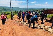 MELETI RESIDENTS STEP IN TO REPAIR ROAD MELETI RESIDENTS STEP IN TO REPAIR ROAD