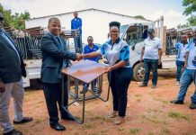 EWSC FURNISHES 100 DESKS, CHAIRS TO UNESWA EWSC FURNISHES 100 DESKS, CHAIRS TO UNESWA