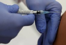 Health workers in Kericho have began receiving Covid-19 vaccine