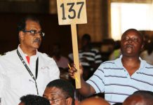 Auctioneers take banks to court over fee tussle