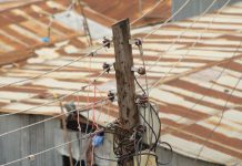 In Kenya’s slums, gangs supply power and extort businesses In Kenya's slums, gangs supply power and extort businesses