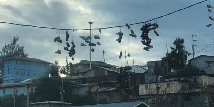 Stories Behind Shoes Hanging on Power Lines Stories Behind Shoes Hanging on Power Lines