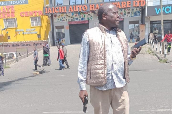 MP Arama draws gun as protesters stage demos in Nakuru MP Arama draws gun as protesters stage demos in Nakuru