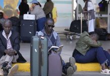 Flights grounded at Kenya’s main airport as workers protest against Adani deal Flights grounded at Kenya's main airport as workers protest against Adani deal