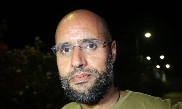 نيويورك تايمز: سيف الإسلام القذافي حي في الزنتان ويطمح للرئاسة.. غيّره السجن ولم يغير رأيه بعهد والده أو الثوار نيويورك تايمز: سيف الإسلام القذافي حي في الزنتان ويطمح للرئاسة.. غيّره السجن ولم يغير رأيه بعهد والده أو الثوار