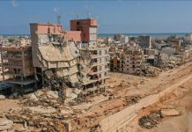 منظمة الصحة العالمية تكافح لمحو آثار فيضانات ليبيا منظمة الصحة العالمية تكافح لمحو آثار فيضانات ليبيا