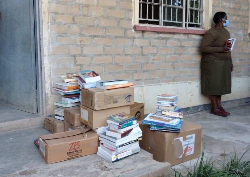 Mzuni donates textbooks to Mzuzu Prison School