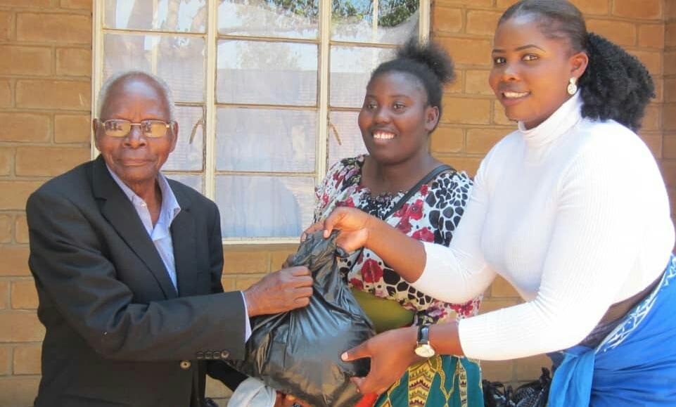 MANEPO helps the elderly in Zomba with assorted items