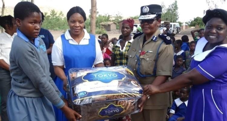 Female Malawi Police officers in Zomba pay fees for needy students