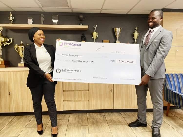 First Capital Bank officially honours K5m promotion prize to school teacher First Capital Bank officially honours K5m promotion prize to school teacher