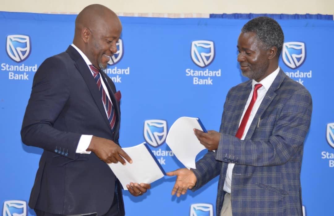 Standard Bank Plc increases scholarship fund with Press Trust to K220 million: To benefit over 40 students Standard Bank Plc increases scholarship fund with Press Trust to K220 million: To benefit over 40 students