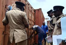 Police hands over shipping containers to refugees Police hands over shipping containers to refugees