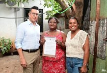 Minister Mohamed Delivers Lease Agreements to Families Minister Mohamed Delivers Lease Agreements to Families