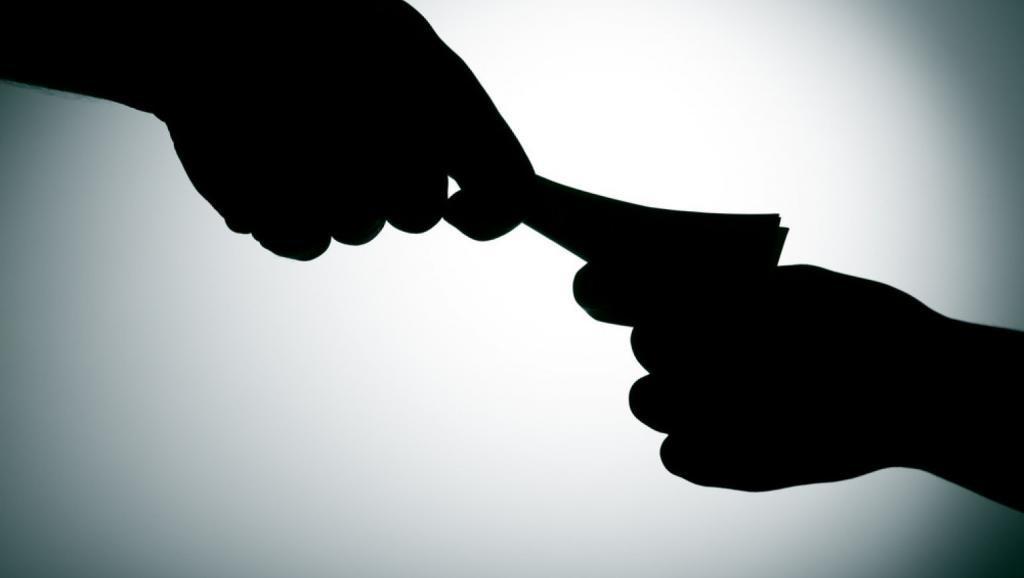 Corrupt officials caught red-handed Corrupt officials caught red-handed