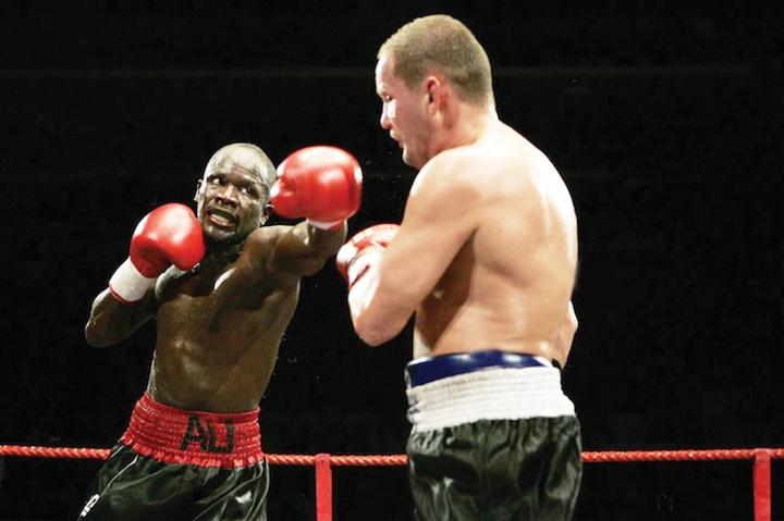 Ex-boxing champ steering army sports