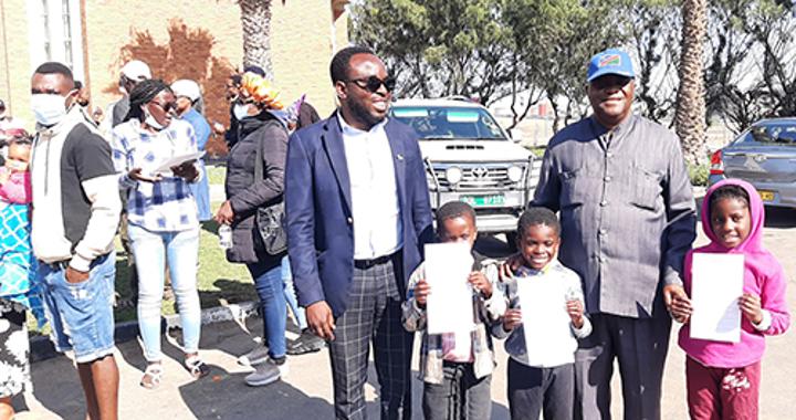 Fire victims receive national documents Fire victims receive national documents