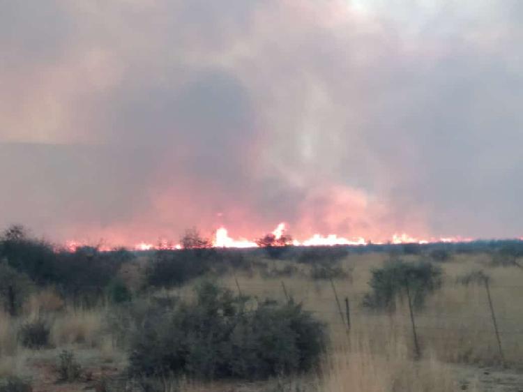 Fire destroys //Kharas farmland Fire destroys //Kharas farmland