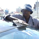 Car washers battle shrinking income at Wernhil Bridge Car washers battle shrinking income at Wernhil Bridge
