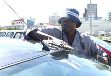 Car washers battle shrinking income at Wernhil Bridge Car washers battle shrinking income at Wernhil Bridge