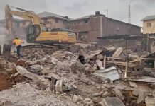 LASEMA demolishes buildings gutted by fire in Lagos
