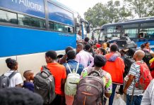 Passengers in Kigali scramble for upcountry-bound buses on Christmas Eve Passengers in Kigali scramble for upcountry-bound buses on Christmas Eve