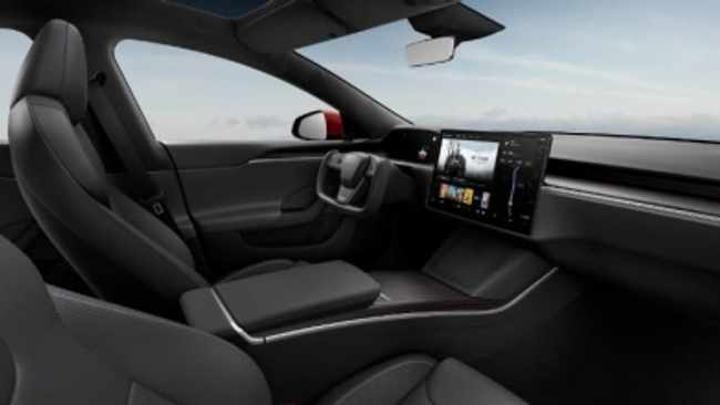 Tesla halts use of video games in moving cars amid safety probe Tesla halts use of video games in moving cars amid safety probe