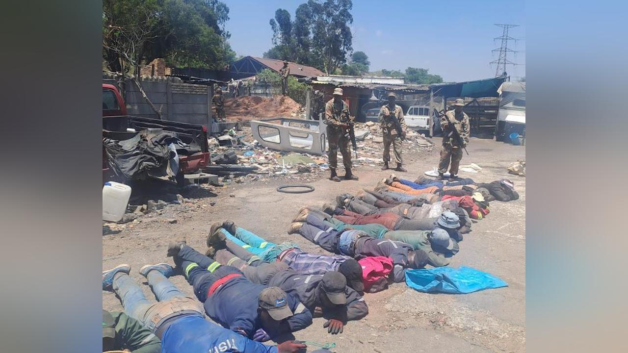 More than 100 suspected illegal miners arrested in SANDF-police raid at Ekurhuleni informal settlement More than 100 suspected illegal miners arrested in SANDF-police raid at Ekurhuleni informal settlement