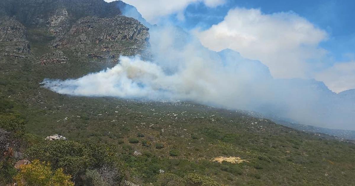 Helicopter Deployed as Camps Bay Fire Smoulders Helicopter Deployed as Camps Bay Fire Smoulders