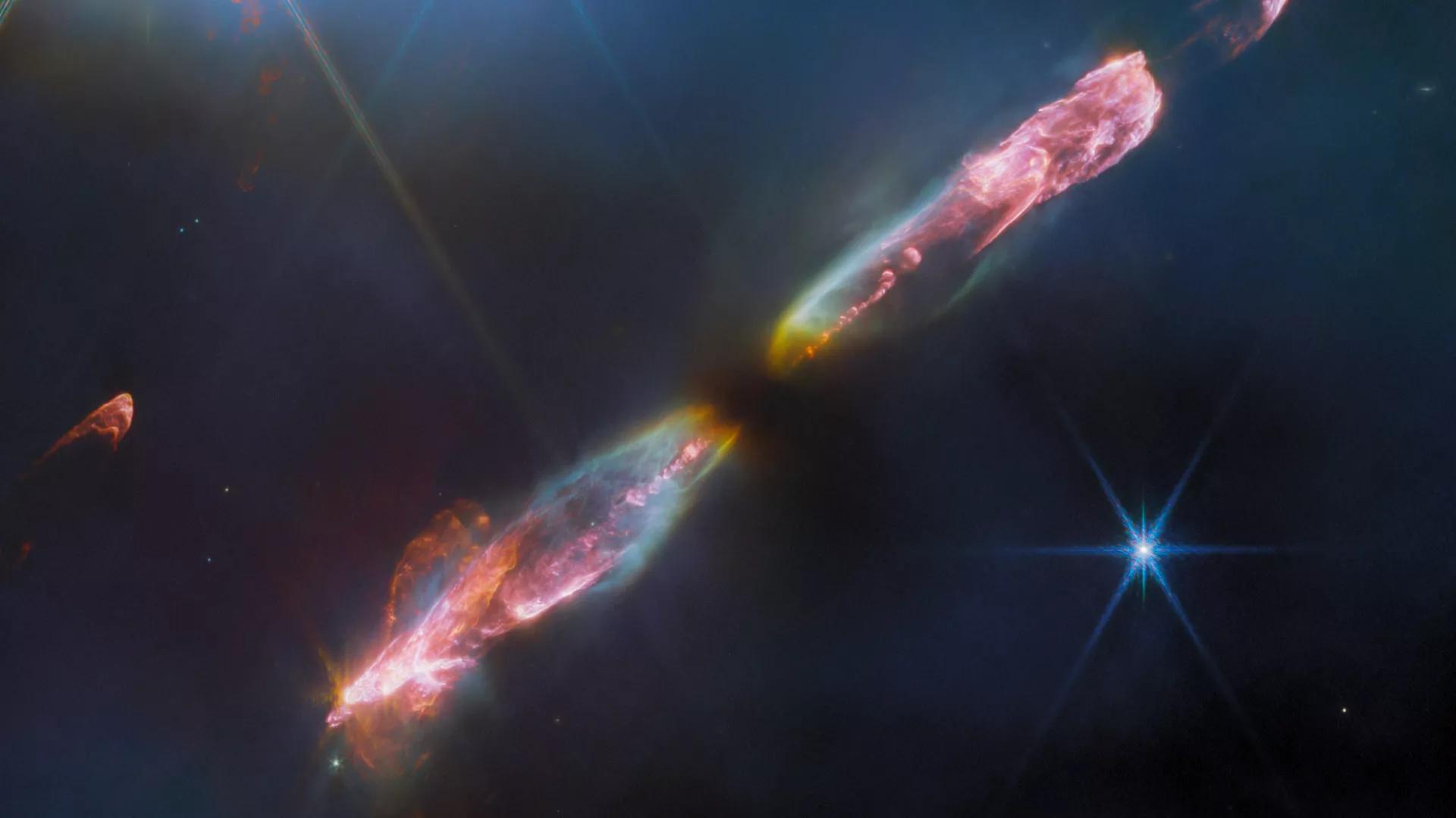 NASA's Webb Telescope Captures Stunning Image of Herbig-Haro 211 Infant Stars NASA's Webb Telescope Captures Stunning Image of Herbig-Haro 211 Infant Stars