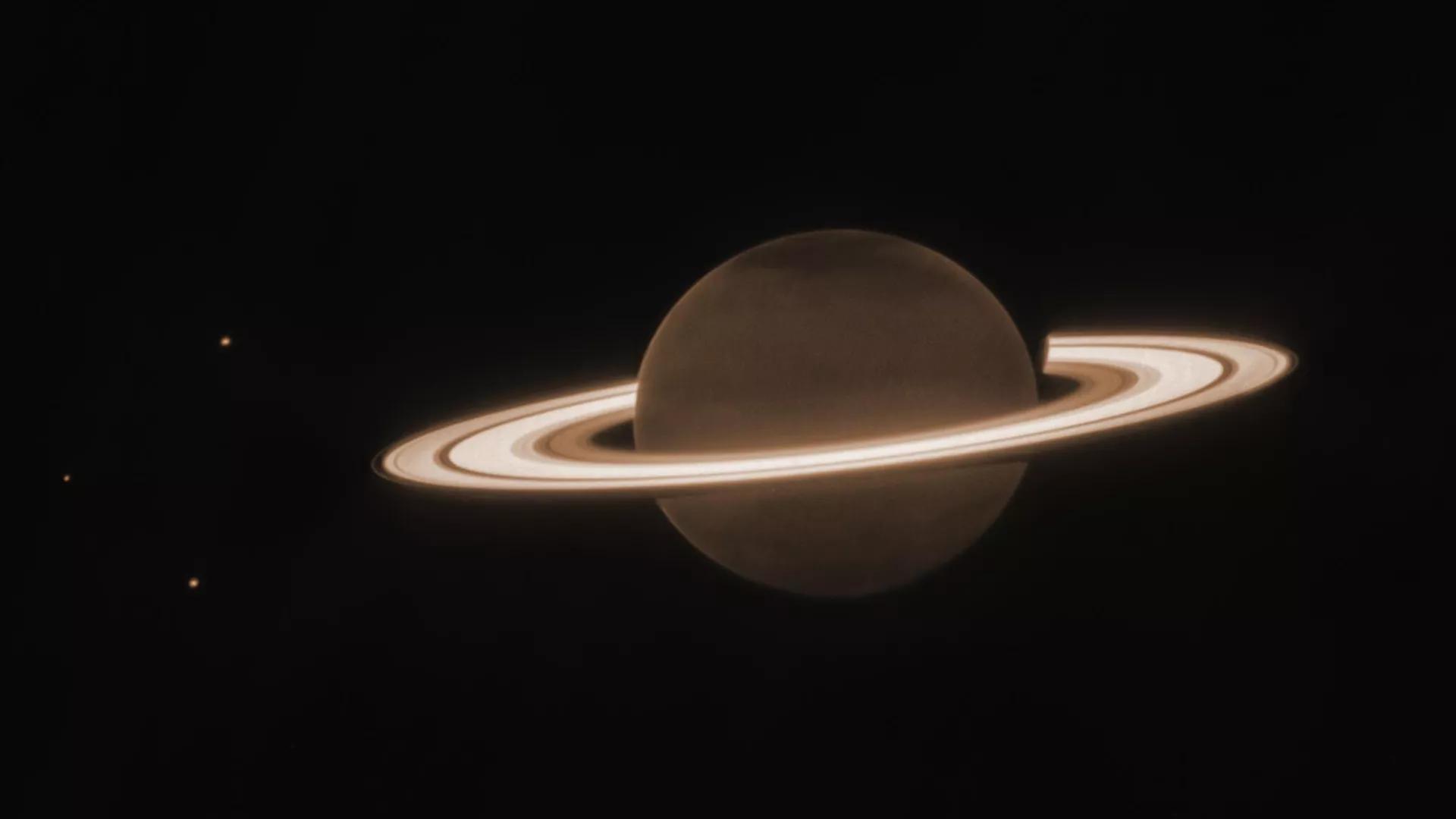 Saturn's Rings and Moons: Collision Course Revealed by Supercomputer Simulations Saturn's Rings and Moons: Collision Course Revealed by Supercomputer Simulations