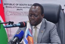 Finance minister announces tough budget cuts and new taxes Finance minister announces tough budget cuts and new taxes