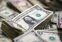 تحذيرات واسعة من خطوة وزارة المالية بتوحيد سعر الصرف والجمركي