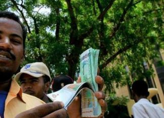 حمدوك يتحدث عن سعر الدولار وقانون جديد للبنك المركزي سوق تصريف الدولار