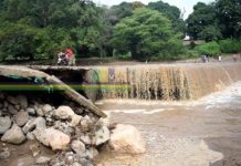 FLOODS WREAK HAVOC AS THREE REGIONS SEEK SOLUTION