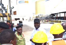 GOVT INVESTIGATES LAKE OIL GROUP DEPOT FIRE SOURCE