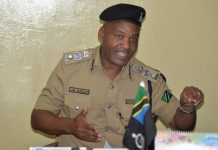 SEVEN PEOPLE HELD OVER DEATH OF WOMAN, DAUGHTER