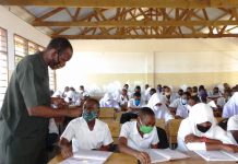 ALL SMILES AS STUDENTS RETURN TO SCHOOLS