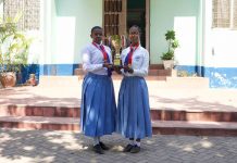 GIRL STUDENTS SCOOP ANIMAL FEED SCIENCE AWARD