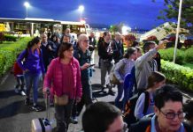 TOURISTS FLOCK IN AS VIRUS FEAR WANES