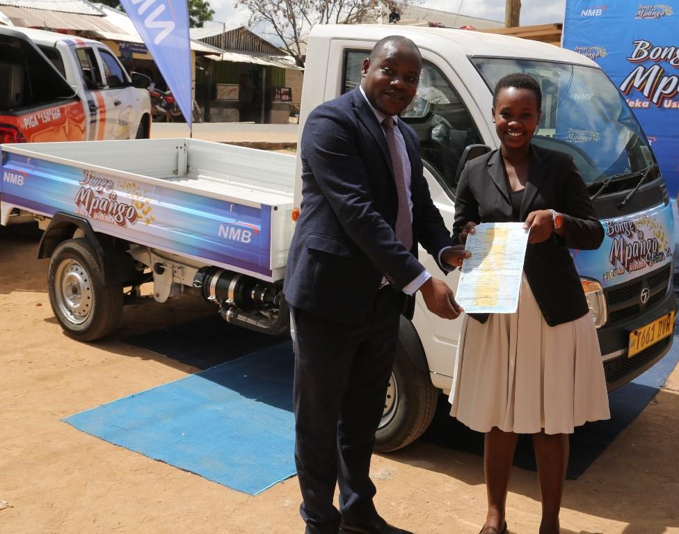 Dodoma resident wins 25m/- brand new car in bank campaign Dodoma resident wins 25m/- brand new car in bank campaign