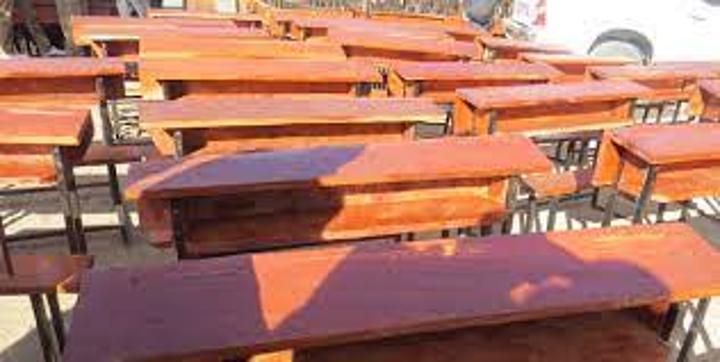 Stanbic hands over 100 desks to Tuangoma School Stanbic hands over 100 desks to Tuangoma School