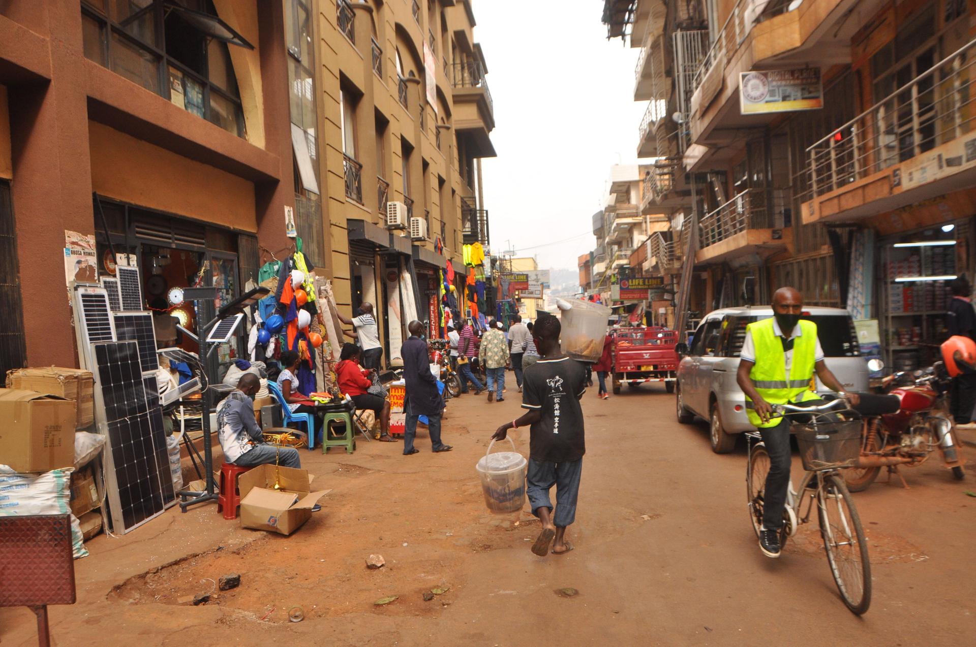 Kampala traders defy govt guidelines, reopen shops Kampala traders defy govt guidelines, reopen shops